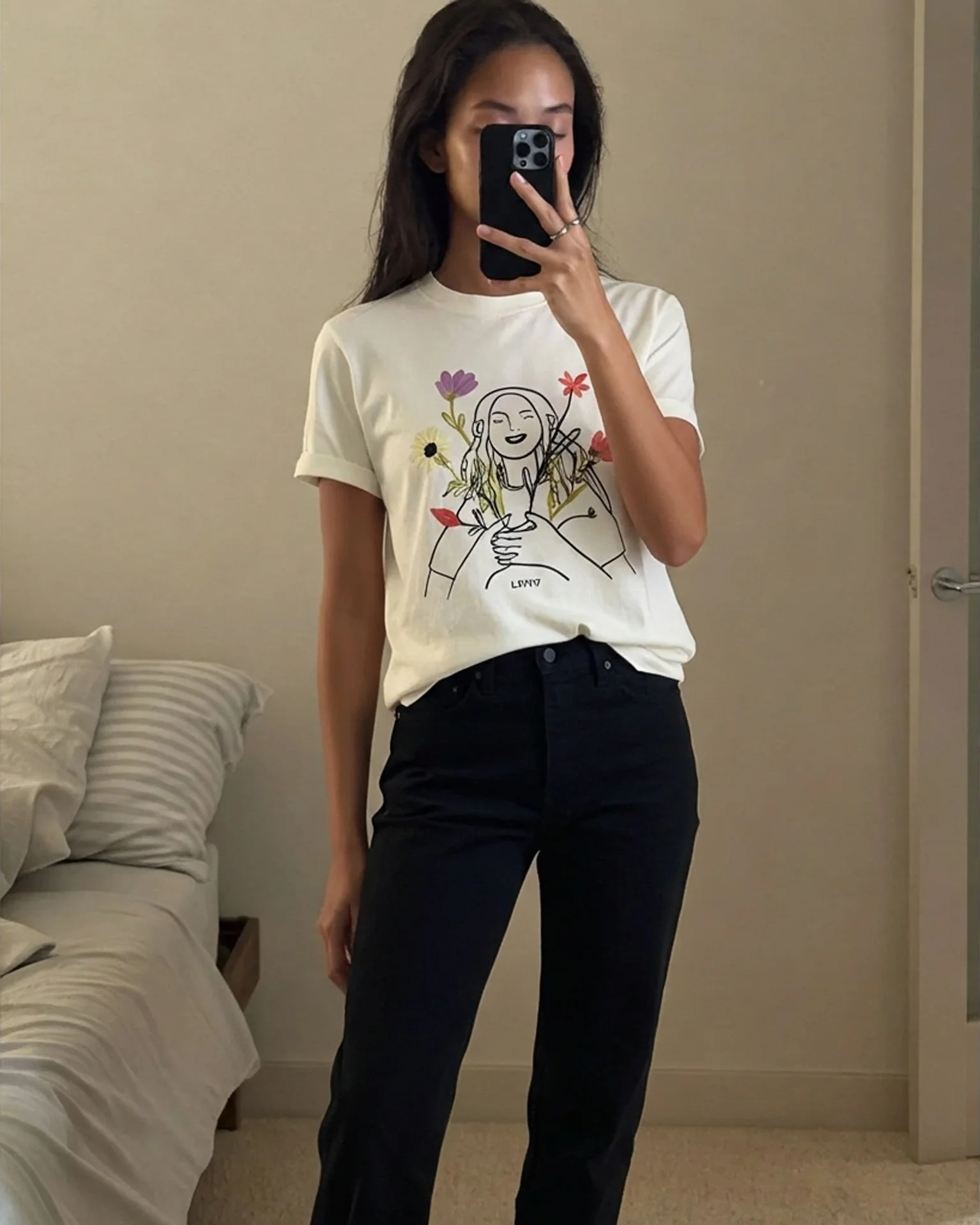 Black Ribcage high-rise jeans sitting at the natural waist — after