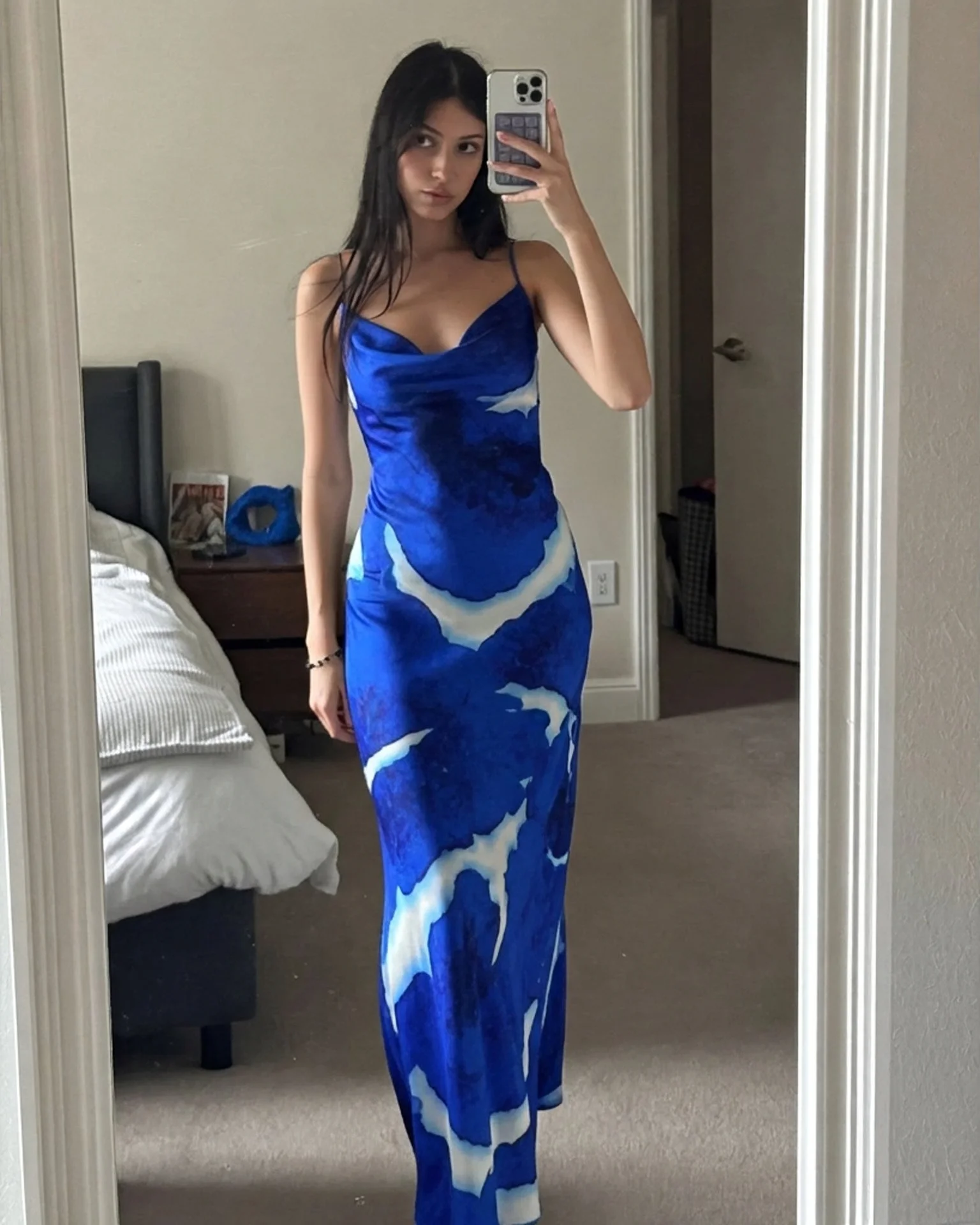 Bold floral print dress on a casual mirror pose — after